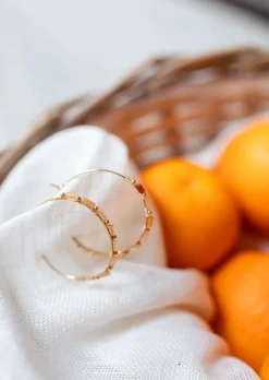 Online Boucles d’oreilles Guna dorées | Anneaux perlés | Prêt-à-porter en ligne | Easy Clothes Boucles d'oreilles