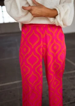 Online Pantalon Thaly rose avec motifs oranges | Pantalon satiné fluide | Prêt-à-porter en ligne | Easy Clothes Femme Pantalons